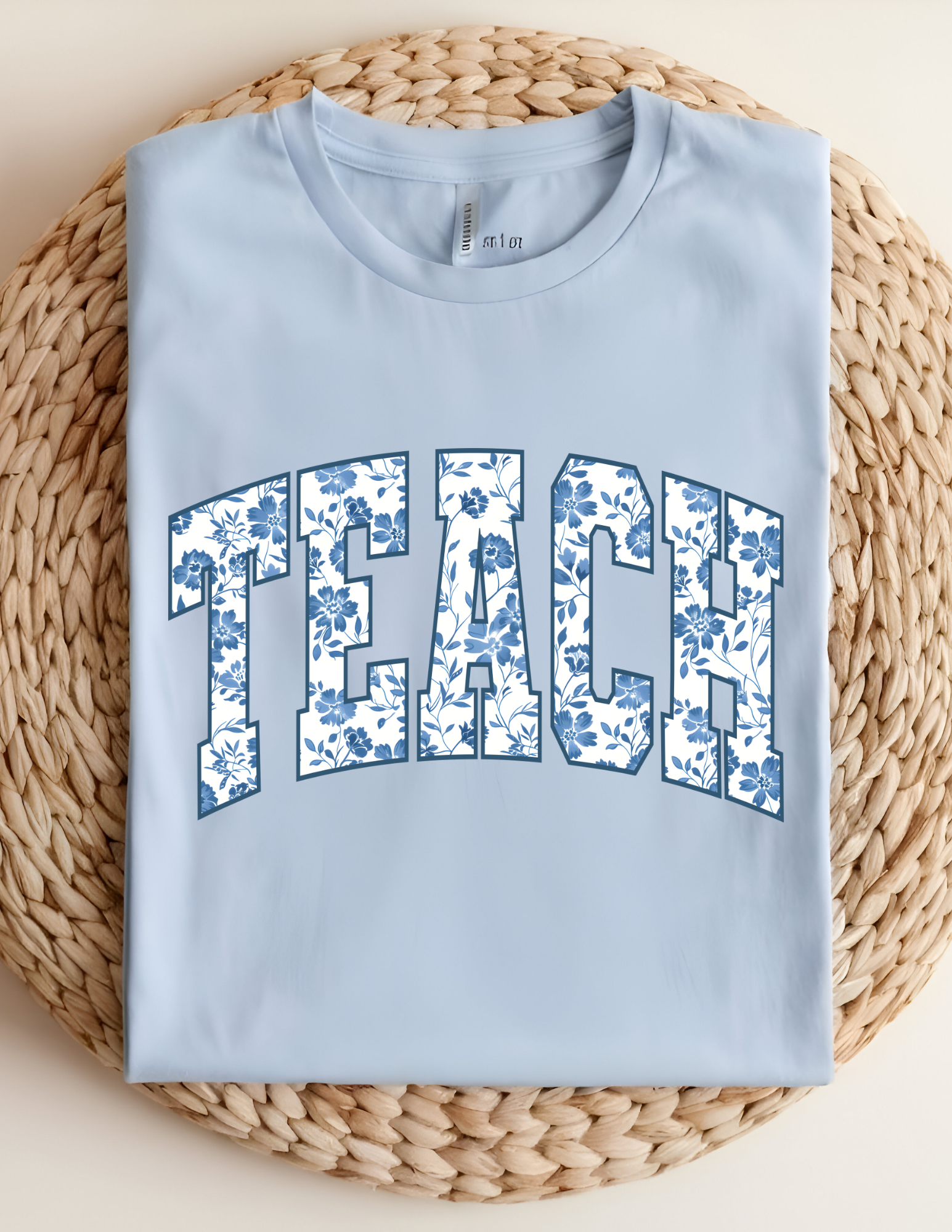 Floral “TEACH” Statement Tee