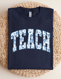 Floral “TEACH” Statement Tee