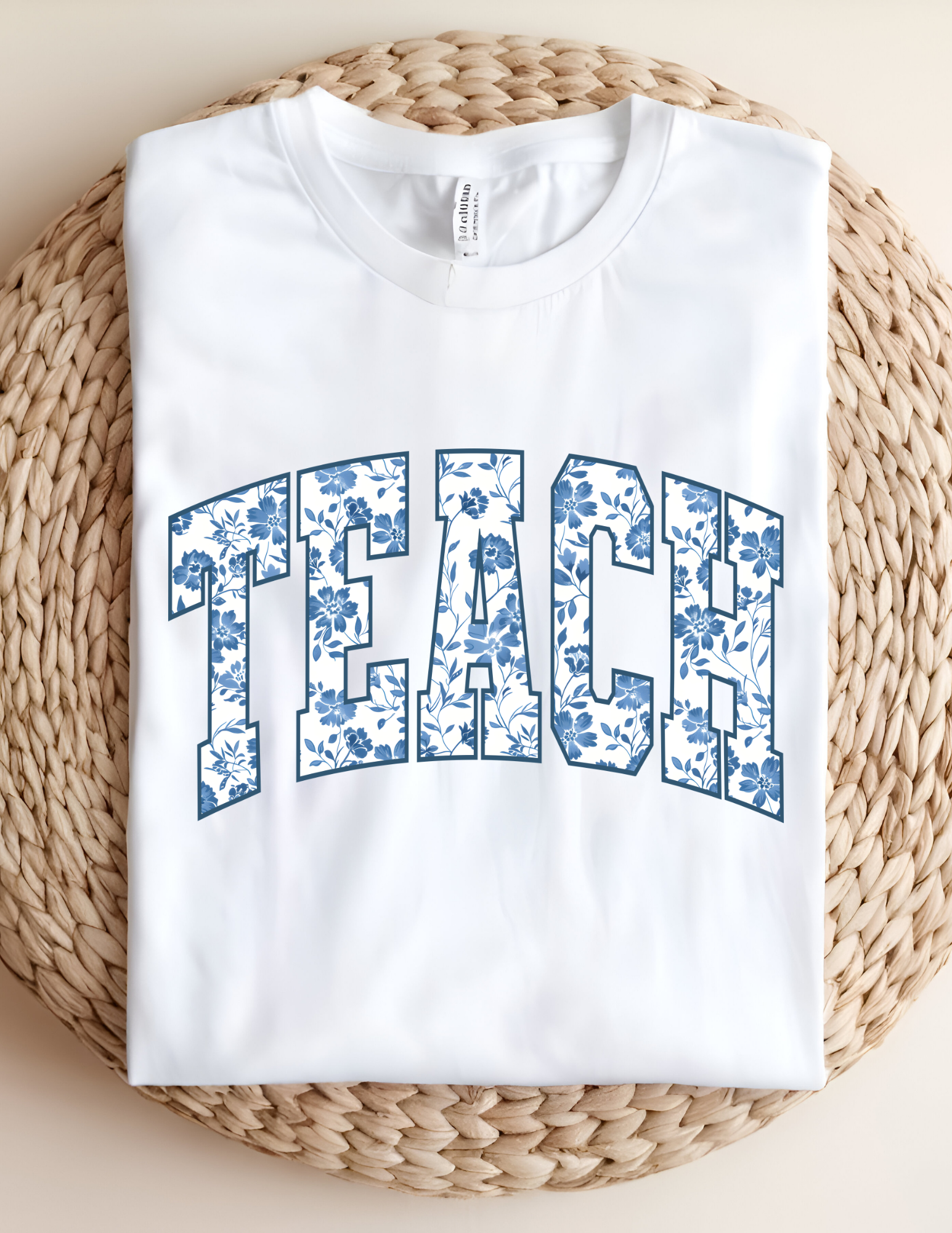Floral “TEACH” Statement Tee